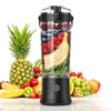 Black portable blender with fruits inside, surrounded by various fruits on a white background